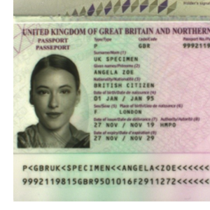 Passport photograph with part of the document missing